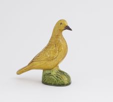 A Chinese yellow-glazed figure of a bird, Qing Dynasty, 18th century