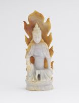 A Chinese pale lavender jade figure of a buddha, 19th century