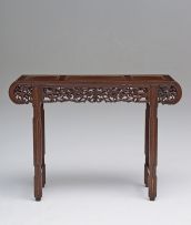 A Chinese carved hardwood and hongmu altar table, late 19th century
