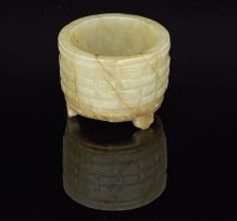 A Chinese mottled celadon jade carved brush pot, late 19th century