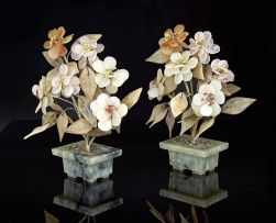 A near pair of Chinese jade, rose quartz, agate and hardstone flowering trees, mid 20th century