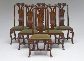 A set of six Queen Anne walnut and marquetry dining chairs, circa 1720