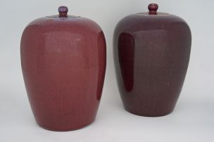 Two Chinese flambé and copper-red glazed jars and covers, Qing Dynasty, late 19th century
