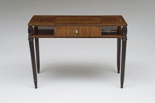 An Art Deco palissandre veneered and ebonized table, possibly French, 1930s