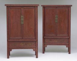 A pair of Chinese red lacquer and fruitwood cupboards, late 19th/early 20th century