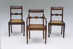 Three Cape Regency stinkwood, yellowwood, mahogany and brass-inlaid chairs, 19th century