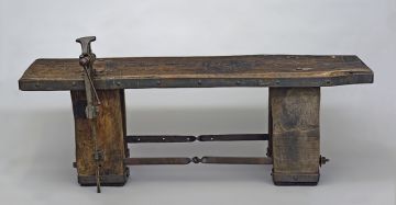 A fruitwood workman's bench