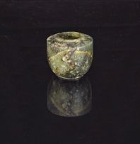 A Chinese miniature carved dark mottled green jade jar, 19th century