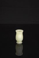 A miniature Chinese carved celadon jade archaistic vase, Zhi ,19th century