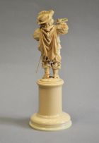 A Dieppe carved ivory figure of a trumpeting Cavalier, French, late 19th century