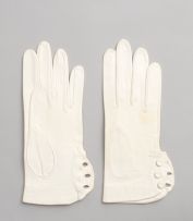 Two pairs of Christian Dior cream-coloured kid leather gloves