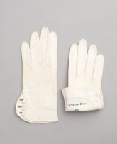 Two pairs of Christian Dior cream-coloured kid leather gloves