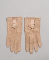 Two pairs of Christian Dior cream-coloured kid leather gloves