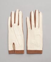 Two pairs of Christian Dior cream-coloured kid leather gloves