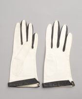 Two pairs of Christian Dior cream-coloured kid leather gloves