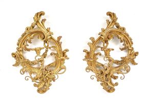 A pair of Louis XVI style three-light giltwood wall sconces