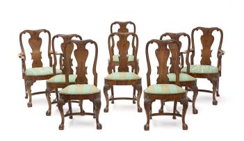 A set of eight George II style walnut dining chairs, 20th century
