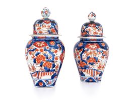 A pair of Japanese Imari vases and covers, Meiji Period (1868-1912)