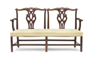 A George III style mahogany two-seater settee, 19th century