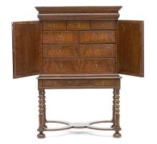 A walnut and inlaid cabinet-on-stand, 18th century and later