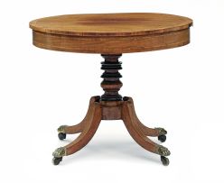 A Regency mahogany single pedestal extending table
