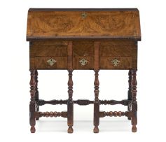 A Queen Anne walnut and feather-banded writing desk, 18th century and later