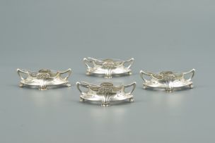 A set of four German Art Nouveau silver two-handled salts, .800 standard