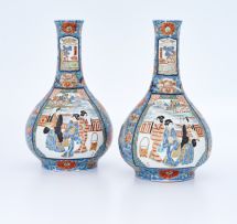 A pair of Japanese Imari bottle vases, late Meiji Period (1868-1912)