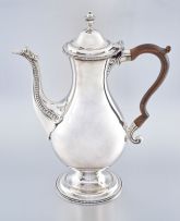 A George III silver coffee pot, maker's mark worn, London, 1780