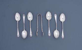 A cased set of six Edward VII silver teaspoons and a pair of sugar tongs, Henry Moreton, Birmingham, 1905 and 1907, retailed by Harris & Co