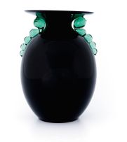 An Italian black and green glass vase