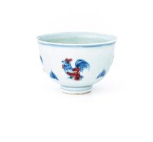 A Chinese blue and iron-red wine cup, Qing Dynasty, 19th century