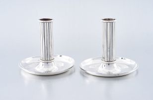 A pair of Danish sterling silver candlesticks, designed by Sigvard Bernadotte for Georg Jensen, post 1945, No. 948
