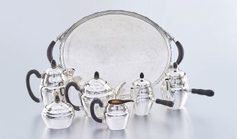 An assembled Danish four-piece sterling silver tea and coffee service, Georg Jensen, 1927-1932, No. 28