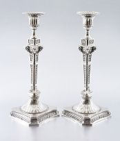 A pair of Neo-Classical style silver candlesticks, maker's mark possibly an unrecorded mark of Wolf & Knell, Hanau, circa 1905