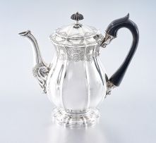 A George IV silver coffee pot, maker's mark WE, London, 1823