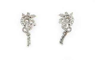 Pair of platinum and gold diamond brooches