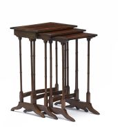 A nest of three Edwardian mahogany and inlaid side tables, Maple & Co