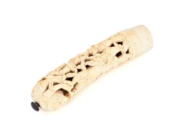 An Indian carved ivory dagger hilt, 19th century