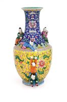 A Chinese famille-rose yellow-ground vase, Qing Dynasty, 19th century
