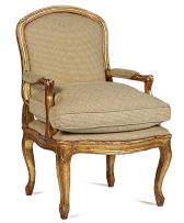 A Louis XV style giltwood and upholstered armchair