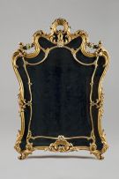 A Rococo style carved giltwood and painted overmantel mirror, 19th century
