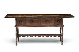 A walnut four drawer centre table, 18th century