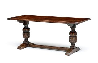 A late Victorian oak trestle table