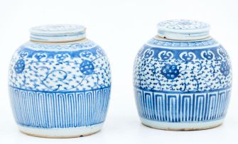 A pair of Chinese blue and white jars and covers, 19th century