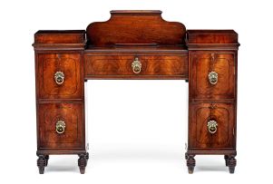 A Regency mahogany and inlaid twin-pedestal sideboard