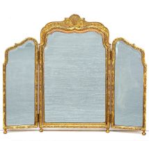 A George I style carved gilt gesso three-fold mirror