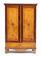 A West Coast cedarwood and stinkwood inlaid cupboard, 19th century