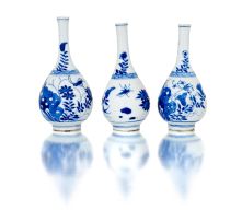 A pair of Chinese blue and white bottle vases, Qing Dynasty, late 18th/early 19th century