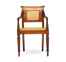 A Colonial teak and caned armchair, 19th century